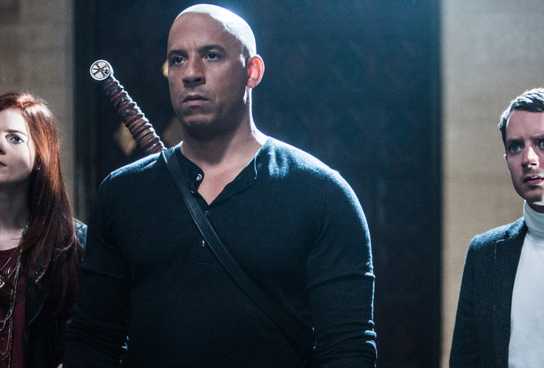 Rose Leslie, Vin Diesel & Elijah Wood stand together looking at someone off-screen in The Last Witch Hunter